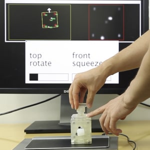 PneuModule: Using Inflatable Pin Arrays for Reconfigurable Physical Controls on Pressure-Sensitive Touch Surfaces